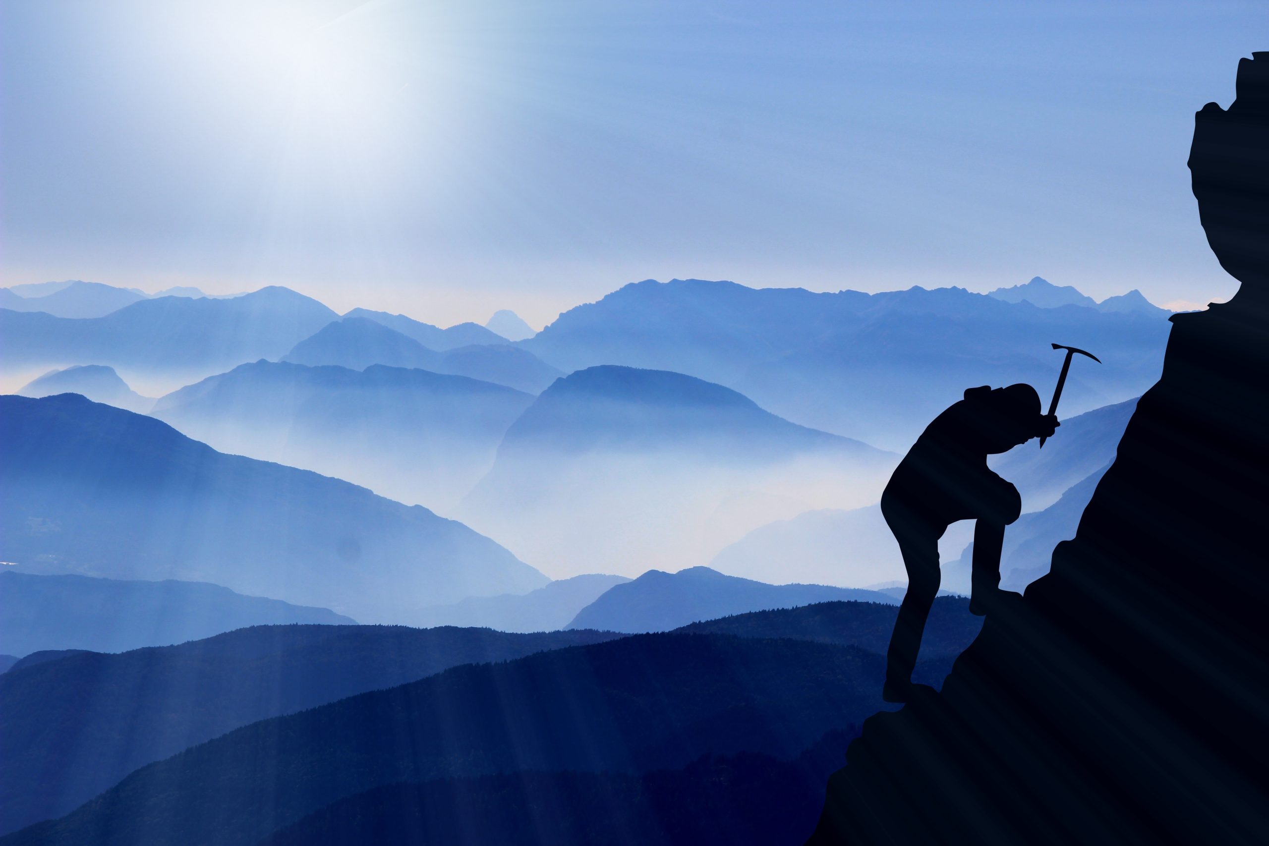 Climber scaling a mountain, each step closer to better agency evaluation feedback